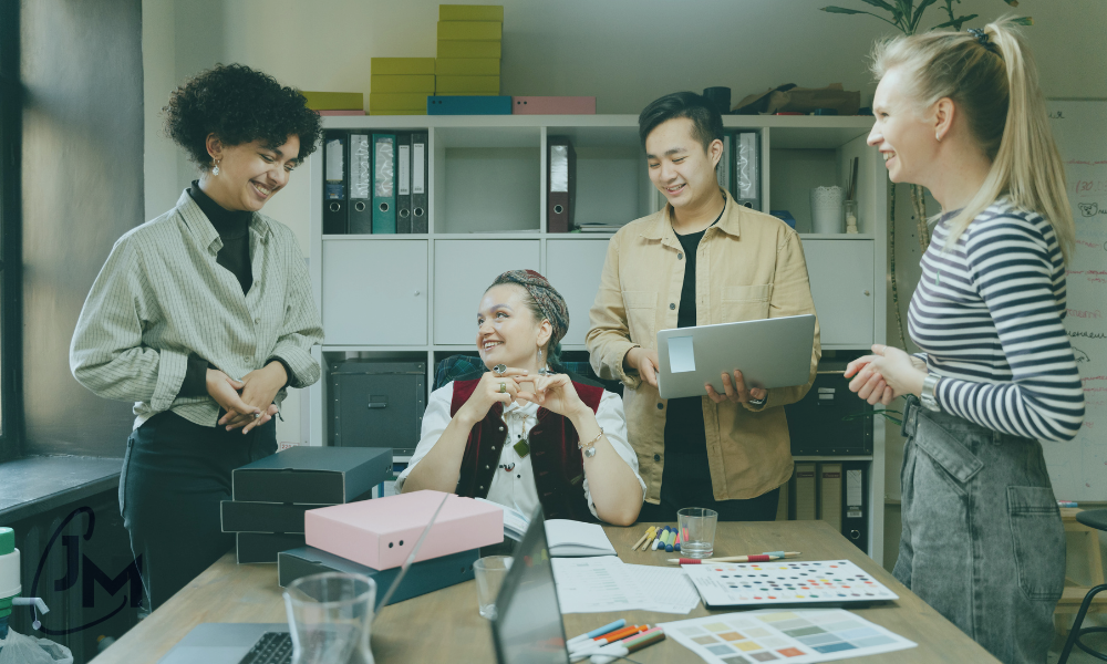 Diverse corporate team having an open, collaborative discussion in a modern office meeting